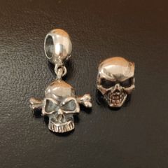 2 silver tone charms skull & skull bones