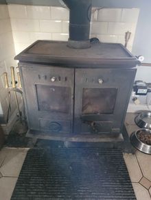 Stove with back boiler