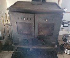 Stove with back boiler
