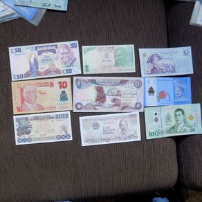 Lot of 9 Uncirculated World Banknotes.No 4.