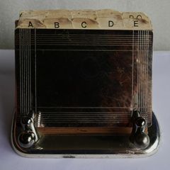 Vintage Silver Plated Flip-style Index  "number finder" used to organize contacts alphabetically.