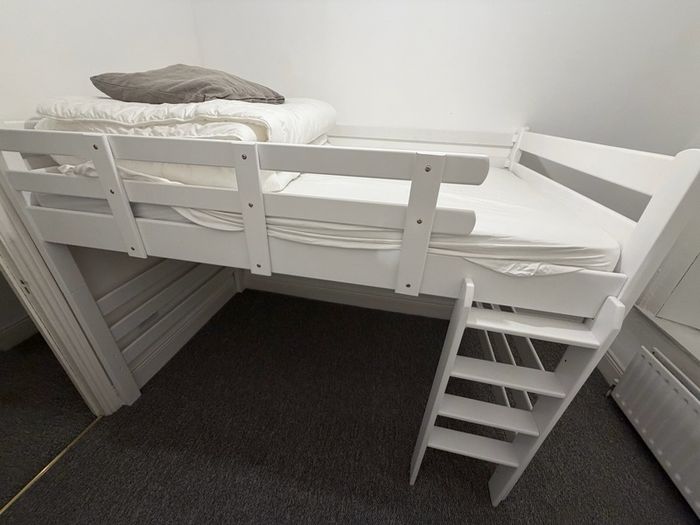 Raised loft double bed with mattress