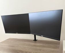 Dual 27 Inch ASUS Eye Care monitors and monitor arm