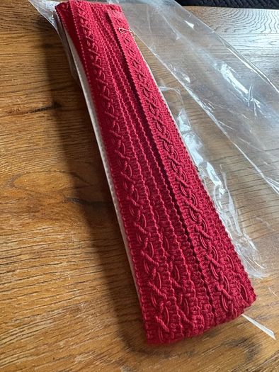 New 5.75 metres of red half in thick upholstery gimp