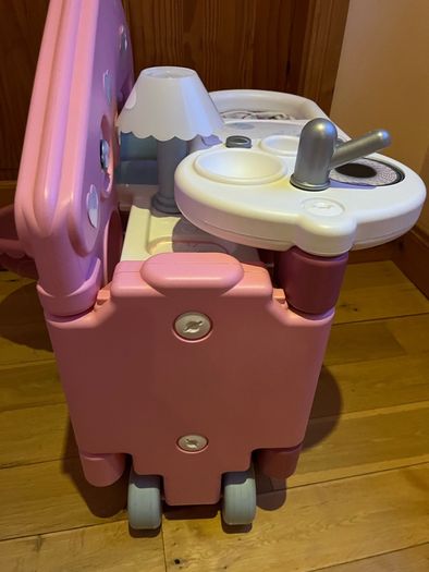 Baby doll play centre with high chair, bath and cot.