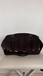 Louis Vuitton burgundy bag