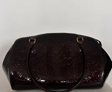 Louis Vuitton burgundy bag