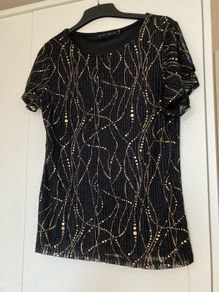 Black & gold top from Saint Maine