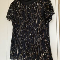 Black & gold top from Saint Maine