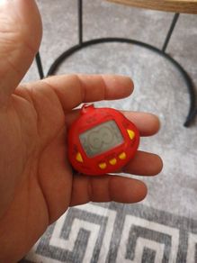 vintage  dinkie dino red tamagotchi