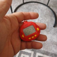 vintage  dinkie dino red tamagotchi