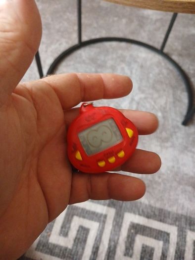 vintage  dinkie dino red tamagotchi