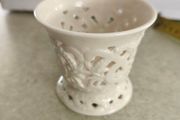 Vintage porcelain tealight holder. Bright white. Filigree. Cut out. Candle. Regal. Circa late 20th century.