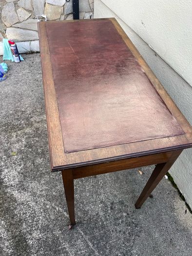 Maghoney wine leather desk with 2 drawers. Inlaid