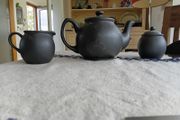 Ceramic teapot, jug and bowl