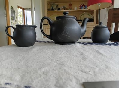 Ceramic teapot, jug and bowl