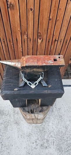 anvil on timber stand