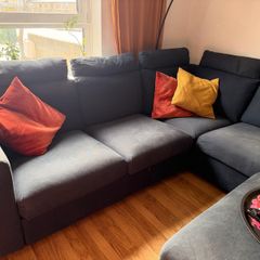 Corner sofa and footstool with storage