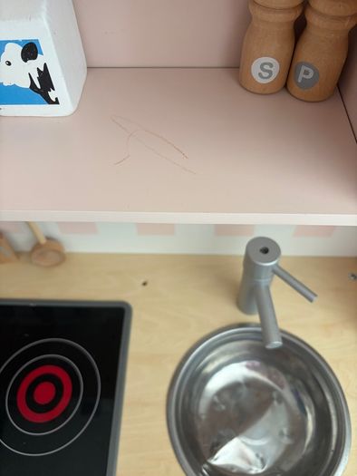 Little girls pink wooden kitchen