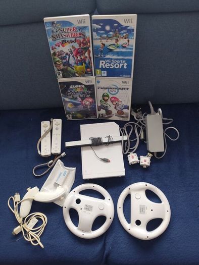 Wii with Mario kart, Sports resort, Mario Galaxy, Smash Brawl and HDMI