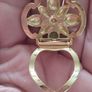 Vintage gold tone dress clip. Image 4