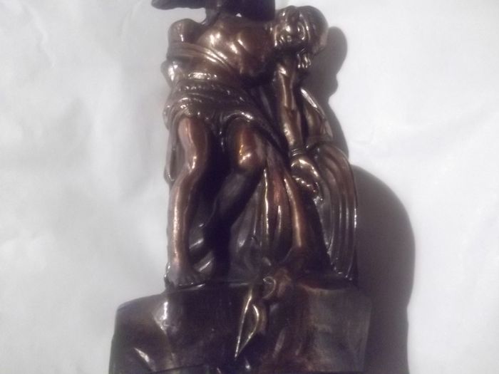 a bronze or metal the death of cuchulainn statue
