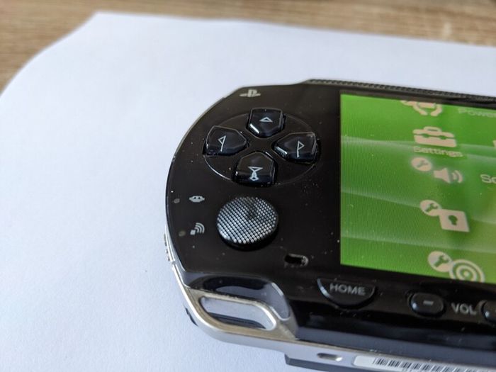 PSP original console with charger and battery