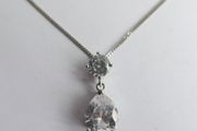 Vintage 925 Sterling Silver necklace with teardrop and round stone pendant