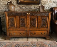 Jacobean Revival Carved Oak Coffer.