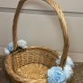 Wicker basket with artificial blue flowers. Image 5
