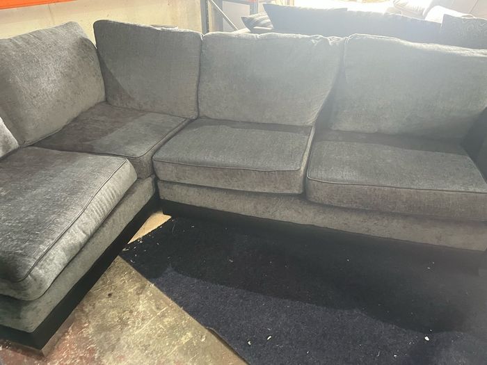 Black corner sofa with matching 2 seater