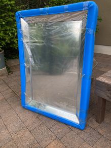 Large mirror in frame
