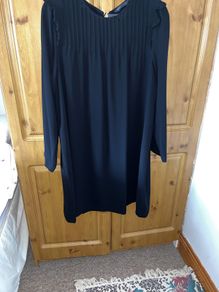 Dress M&S, black, long sleeves, very dressy, round neck with pleated detail at top.