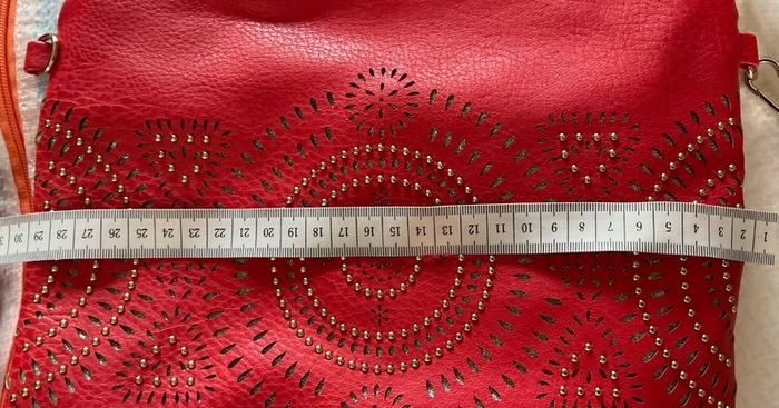 Never used  Red/ dark orange colour with gold beads and silver glitter details