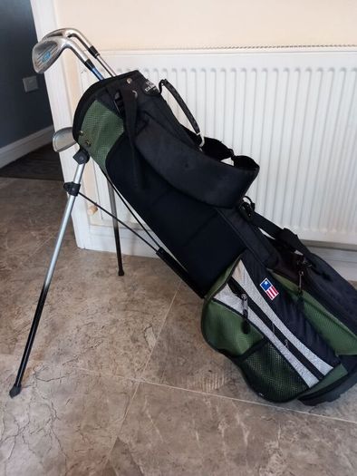 Junior golf clubs and bag with stand