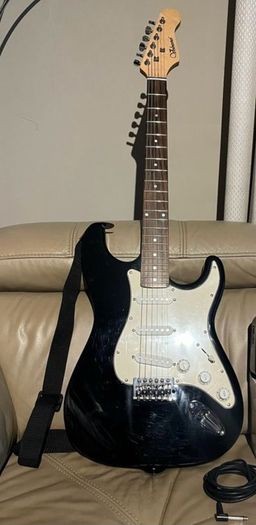 Electric Guitar with cable and strap