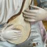 Antique bisque figure of young musician. Image 3