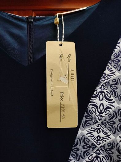 Ladies Avalon dress, with zip opening fully lined, New with tags.