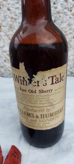 vintage bottle of winters tale sherry 3/4 full ,found in a old pub closed down,
