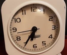 white alarm clock