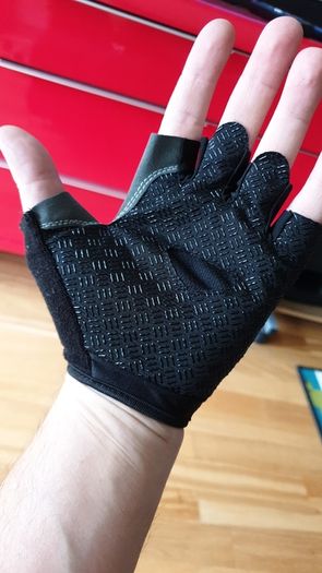 Gym gloves. Fingerless gloves. Cycling gloves. Work gloves. Carpenter gloves. Weightlifting. Workout.  Fitness.  Bodybuilding