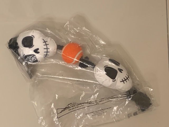 Halloween skull and tennis ball dog toy