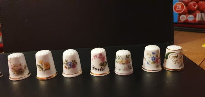 Collection of Flower Themed Gold Coloured Edged Thimbles