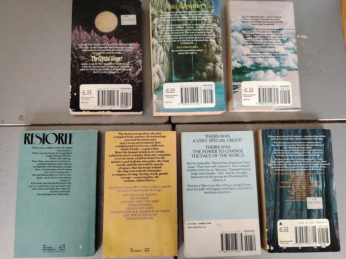 A collection of  7 Anne McCaffrey Books