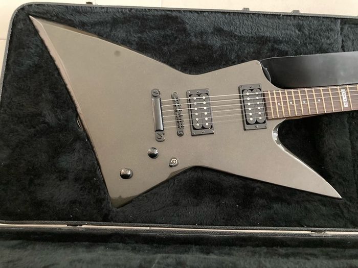 ESP LTD Explorer EX-100 guitar and flight case