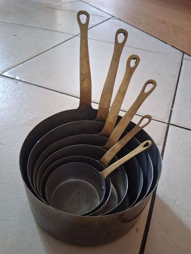 Graduated set French tinned Brass Pots and pans