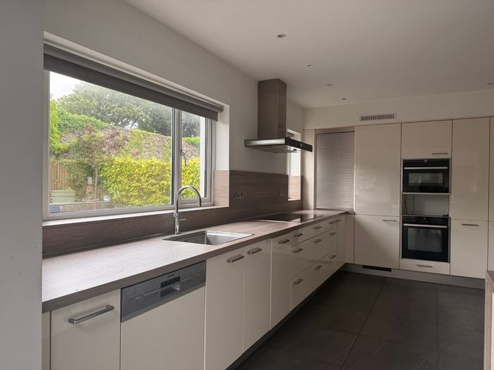 Premium high-gloss fitted kitchen