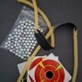 Folding slingshot with accessories. Image 2