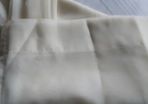 Cream/ivory voille curtains.