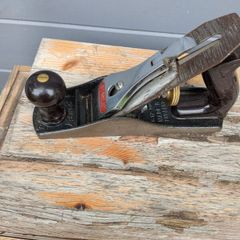 2 Handplanes (Stanleys, Block and No. 4 Bailey), with original holders